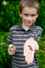 Kid with snails