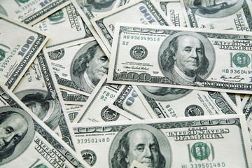 background from chaotically lyings one hundred greenbacks