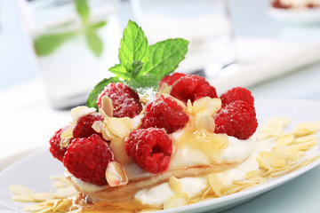Pancakes with curd cheese and raspberries