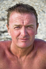 A color portrait of a mature sunburnt man.