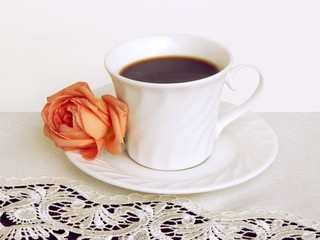 Obraz na płótnie Canvas cup of coffee and tea-rose