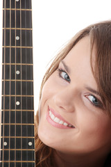 Young woman with black classic guitar