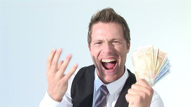 HD1080i Junger erfolgreicher Gesch&auml;ftsmann mit Geldscheinen