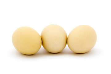 Fresh eggs on white background