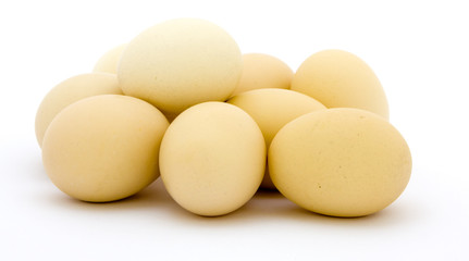 Fresh eggs on white background
