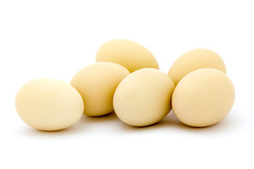 Fresh eggs on white background