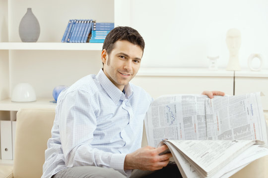 Man reading business news