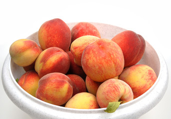 peaches in a bowl