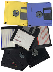 vintage floppy data computer disks isolated on white background, retro technology diversity