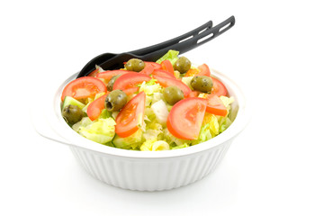 White bowl with fresh salad  on white background
