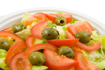 White bowl with fres salad  on white background