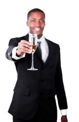 Handsome businessman holdng a glass of champagne