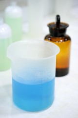 Laboratory stuff, glass cylinder, colorful liquids
