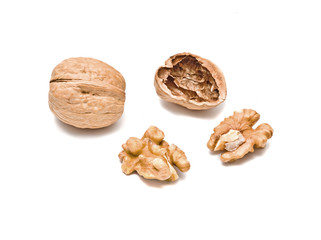 Cracked walnuts isolated on white background