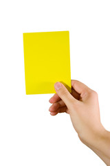 Hand holding a yellow card (isolated on white)