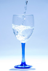 water drop into glass