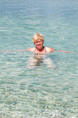 Swimming old woman