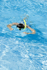 Man Snorkeling in the Pool