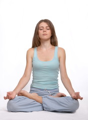 The young girl is engaged in yoga