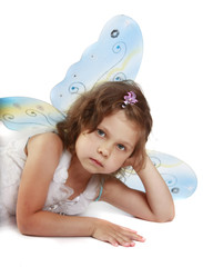 beautiful girl in a fairy costume with butterfly wings