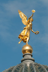 Fototapeta premium Golden angel on the University building (Dresden, Germany)
