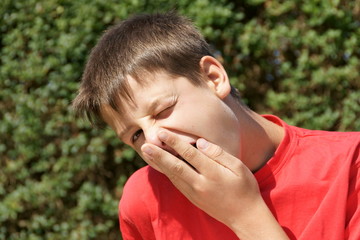 yawning boy red