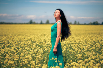 Beautiful woman in the field