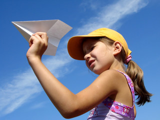 girl with paper plane