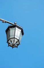 Fototapeta na wymiar Old lantern with sky background