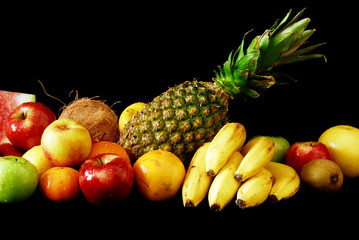 Assorted fresh fruit arranged in line