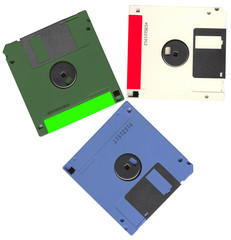 heap of vintage floppy data computer disks isolated, plastic