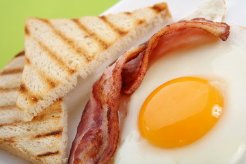 Breakfast - toasts, eggs, bacon