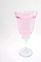 pink wine glass of water