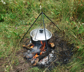 cauldron on a campfire