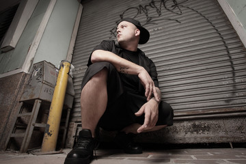 Ground angle view of a man in an urban setting