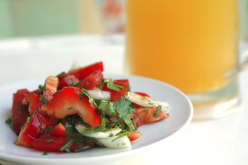 tomato salad and orange juice