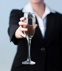 Business woman Holding a Champagne Glass