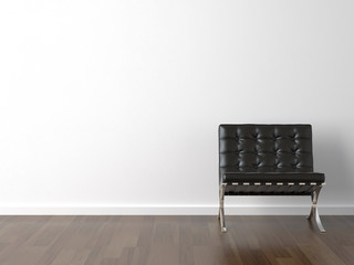 black chair on white wall