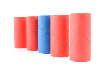 colorful empty toilet paper rolls over white background