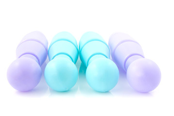 blue and purple colored bowling pins over white background