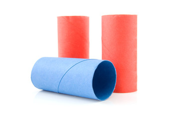 empty red and blue toilet paper rolls over white