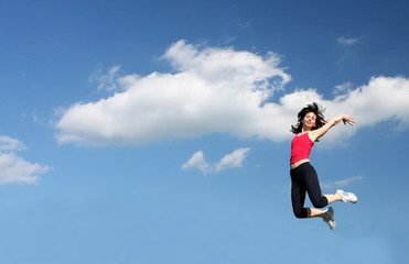 Fototapeta na wymiar Girl jumping