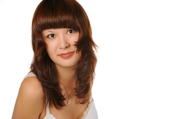 Fototapeta premium The beautiful girl on a white background