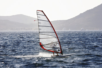 wind surfer enjoying freedom and speed