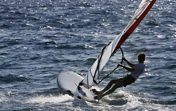 wind surfer heading open sea