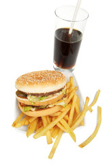 Hamburger meal served with french fries and soda close-up