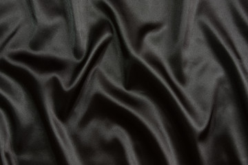 Black silk textile background