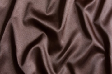 Brown silk textile background