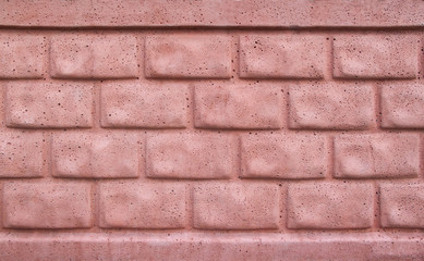 Red concrete brick wall