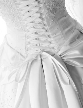 Black And White Image Of Laces On Back Of Wedding Gown